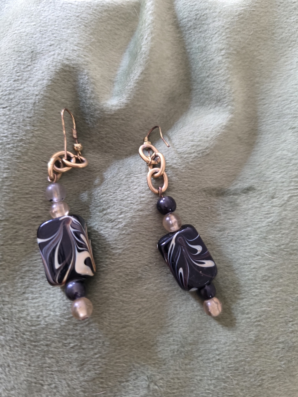 Hand Crafted Black and White Swirl Bead Drop Earrings with Gold Accents